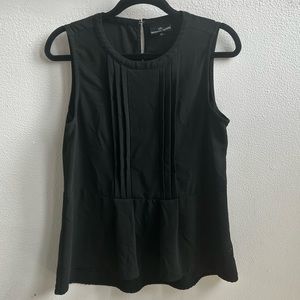 Nursing queen mixed media peplum top. VGUC.